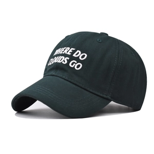 Detailed embroidery of WHERE DO CLOUDS GO on a dark green cotton baseball cap