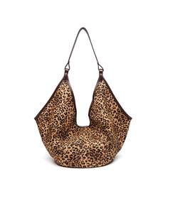 Close-up of a large leopard print tote bag with brown and black vintage leopard patterns