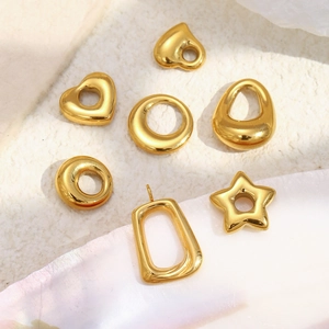 Detailed view of assorted hollow 18K gold plated stainless steel geometric pendants