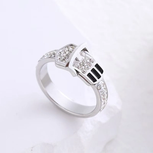 Silver belt buckle ring with micro-pave white cubic zirconia on a minimalist rock base