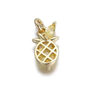 Detailed macro view of 14k gold-plated pineapple pendant with inlaid gemstones