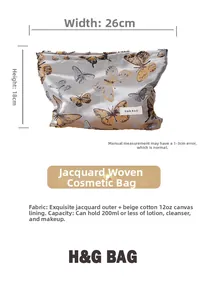 Detail view of the butterfly jacquard makeup bag with 26cm width and 18cm height dimensions