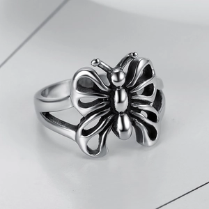 Vintage silver hollow butterfly ring with an antique finish and intricate wing details