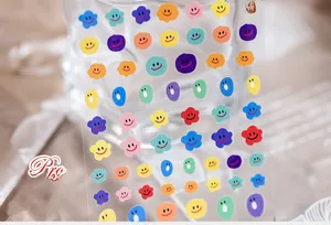 Close-up of KX-072 colorful smiley face nail stickers with vibrant cloud and oval designs