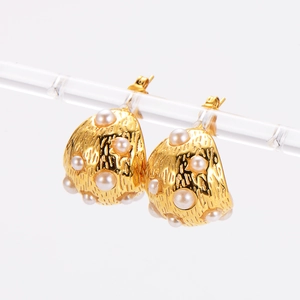 French vintage gold earrings with textured metal surface and embedded white pearls