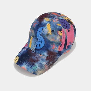 Detail of street fashion baseball cap with blue tie-dye and colorful graffiti patterns