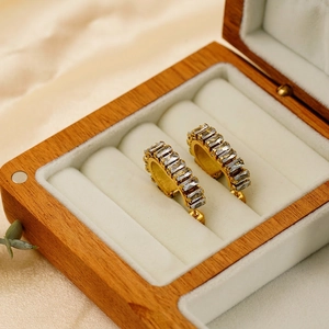U-shaped 18K gold plated stainless steel hoop earrings with baguette-cut zircon pavé