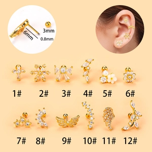 Set of 12 gold helix piercing earrings with cubic zirconia and butterfly wing designs