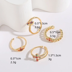 Evil eye and cross adjustable open rings in 14K gold plated brass with zircon stones