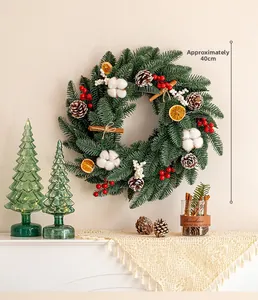 Detail view of 40cm Christmas wreath with cotton, pine cones, berries, and cinnamon