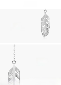 Detailed close-up of S925 sterling silver feather pendant with handmade polished finish