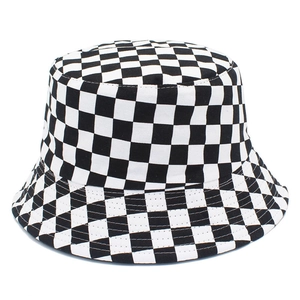 Fashionable reversible checkerboard bucket hat for sun protection with a modern aesthetic