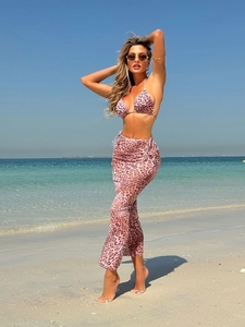 Three-piece leopard print bikini set with sheer mesh maxi skirt for beach vacations