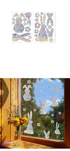 Macro detail of rainbow suncatcher window stickers with floral rabbit patterns in sunlight