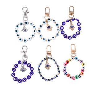 Set of 6 Evil Eye and Hamsa Hand keychains with colorful beads and metal charms