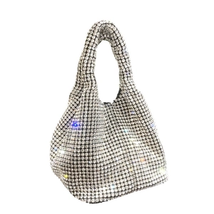 Sparkling silver rhinestone bucket bag with crystal handle and metal mesh for parties