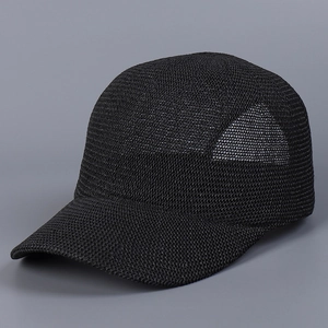 Detail of black breathable mesh knit fabric texture on a summer baseball cap