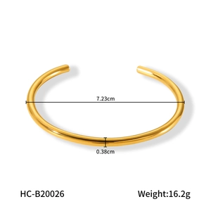 Detail view of 18K gold plated bangle showing 7.23cm inner diameter and 0.38cm thickness