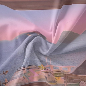 Macro shot of bohemian tapestry fabric showing soft texture and coastal sunset print