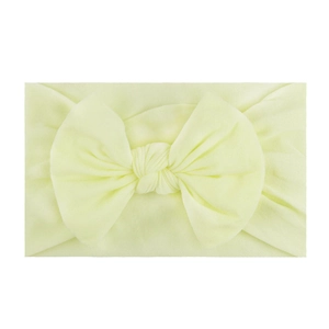 Soft pale yellow nylon headband for babies featuring a large knit bow accessory
