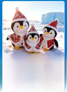 Three plush penguins in festive red floral Christmas hoodies shown in various sizes