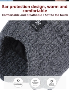 Detail of dark grey knit winter hat with earflaps and soft windproof thermal texture