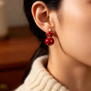 Exquisite 18k gold plated red gourd earring set with traditional Chinese pattern design