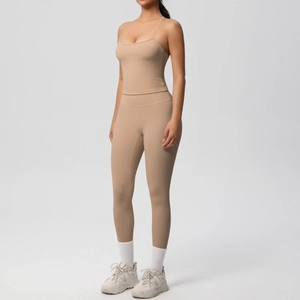 Detail view of the nude yoga set featuring high-waist leggings and slim-fit tank top