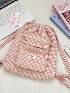 Pink and white checkered quilted drawstring backpack with heart embroidery and front pocket