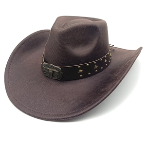 Detail of western cowboy hat featuring a leather band with rivets and a bull head metal buckle
