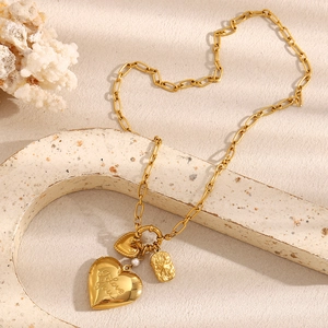 18K gold plated stainless steel necklace with heart pendants and pearl on stone base