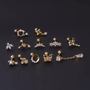 Set of 12 golden stainless steel stud earrings with flower and butterfly zircon designs