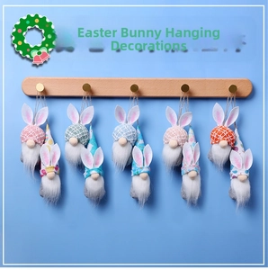 Detail of Easter gnome ornaments with bunny ears and colorful festive patterns