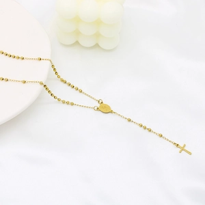 Elegant gold beaded long necklace with Virgin Mary medal and minimalist cross pendant