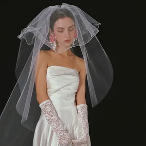 Elegant white double-layer bridal veil with ribbon edge for wedding and photoshoot