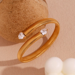 18K gold-plated stainless steel open cuff bracelet with striped texture and heart zircons