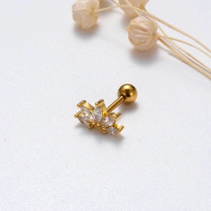 Detailed close-up of lotus stud earring with gold plating and marquise-cut zircons