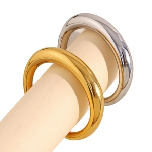 Minimalist thick hollow bangles in 18K gold and silver finish for a modern look