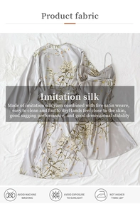 Detail of silver floral print imitation silk robe set with washing care instructions