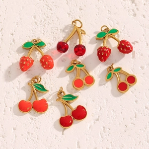 Detail view of seven 18K gold plated cherry pendants for DIY jewelry making accessories