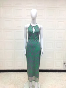 Detail of green and purple marble print halter neck dress with teardrop cutout