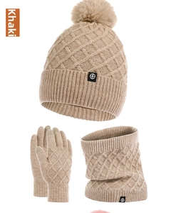 Detail of khaki knit beanie with pom pom, thick infinity scarf and gloves set