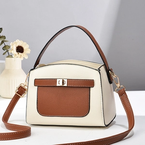 Minimalist multi-layer crossbody bag with beige and brown color blocking and metal clasp