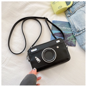 Detail view of the vintage camera-shaped PU leather crossbody bag with spotlight text