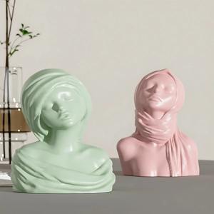 Detailed view of female bust silicone molds for DIY resin and candle art in soft colors