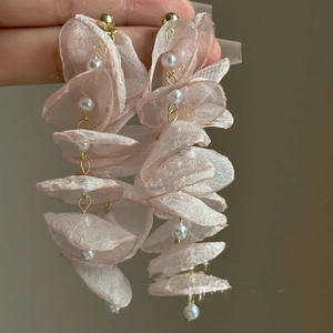 Elegant long chiffon flower drop earrings with white pearls and gold metal finish