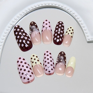 French press-on nails with 3D water droplets, pink and yellow dots on almond shape