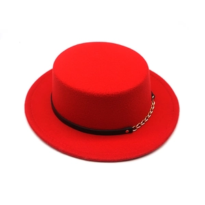 Red wool felt boater hat with black leather band and gold metal chain accent