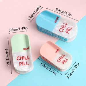 Three acetate pill-shaped hair claws with Chill Pill engraving and size measurements