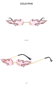 Front and side view of luxury rimless flame sunglasses with gold frame and pink lenses